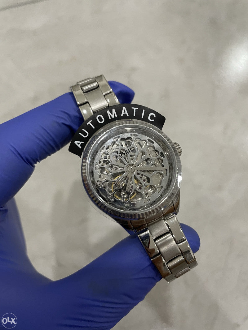  Shop Authentic Fossil Rye Automatic Skeleton Silver Dial Silver Steel Strap Watch for Women - BQ3753 - Luxxuri