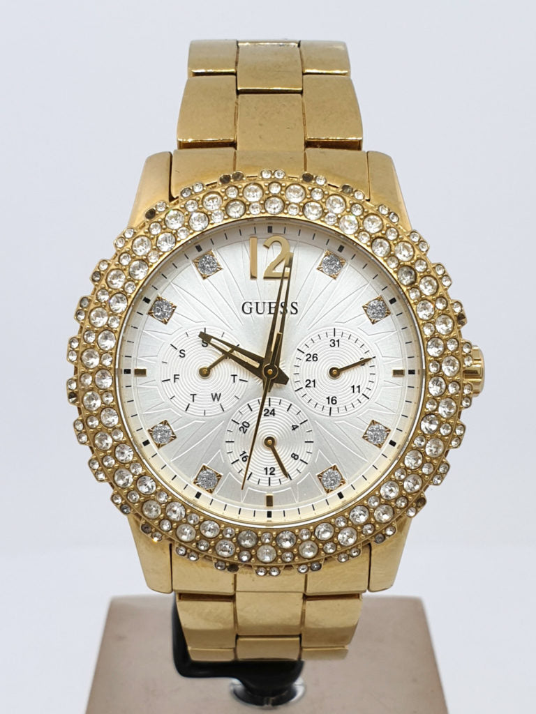  Shop Authentic Guess Dazzler Diamonds Silver Dial Gold Steel Strap Watch for Women - W0335L2 - Luxxuri
