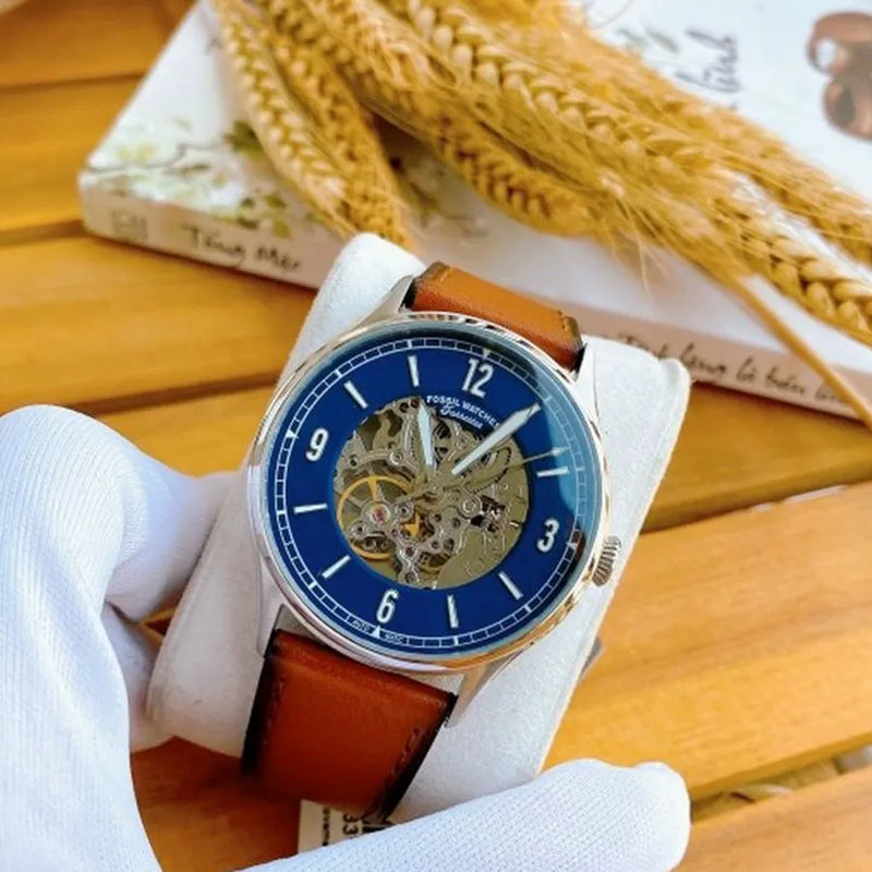  Shop Authentic Fossil Forrester Luggage Automatic Skeleton Blue Dial Brown Leather Strap Watch for Men - ME3179 - Luxxuri