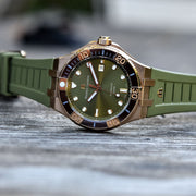  Shop Authentic Maurice Lacroix Aikon Venturer Bronze Dial Green Rubber Strap Watch For Men - AI6058-BRZ01-630-1 - Luxxuri