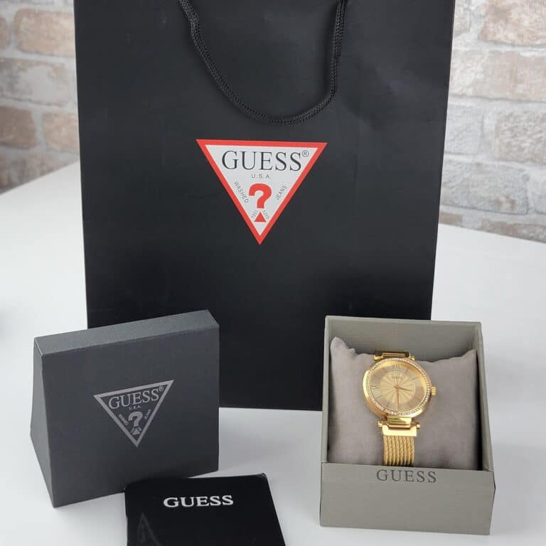  Shop Authentic Guess Soho Champagne Dial Stainless Steel Mesh Bracelet Watch For Women - W0638L2 - Luxxuri
