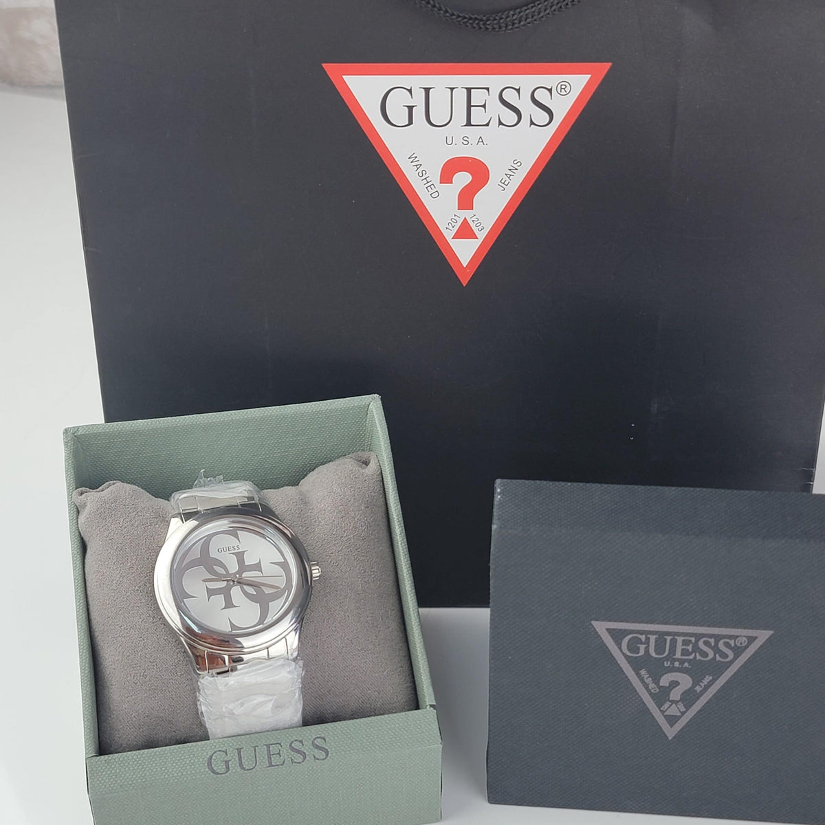  Shop Authentic Guess G-Twist Silver Dial Silver Steel Strap Watch for Women - W1082L1 - Luxxuri
