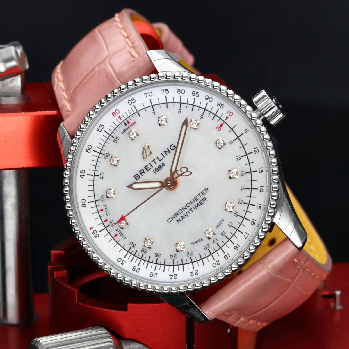  Shop Authentic Breitling Navitimer Automatic 35 Mother of Pearl Dial Pink Leather Strap Watch for Women - A17395211A1P3 - Luxxuri