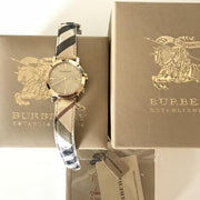  Shop Authentic Burberry The City Gold Dial Haymarket Brown Leather Strap Watch for Women - BU9026 - Luxxuri