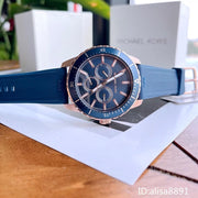  Shop Authentic Michael Kors Cunningham Multifunction Blue Dial Blue Rubber Strap Watch For Men - MK7163 - Luxxuri