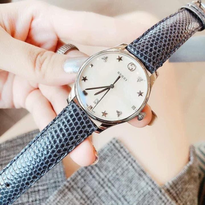  Shop Authentic Gucci G-Timeless Signature Mother of Pearl Silver Dial Blue Leather Strap Watch For Women - YA1264049 - Luxxuri