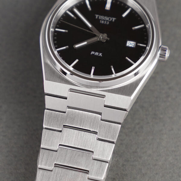  Shop Authentic Tissot PRX Quartz Black Dial Silver Steel Strap Watch For Men - T137.410.11.051.00 - Luxxuri