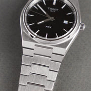  Shop Authentic Tissot PRX Quartz Black Dial Silver Steel Strap Watch For Men - T137.410.11.051.00 - Luxxuri