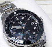  Shop Authentic Tag Heuer Aquaracer Quartz Black Dial Silver Steel Strap Watch for Women - WAY131M.BA0748 - Luxxuri