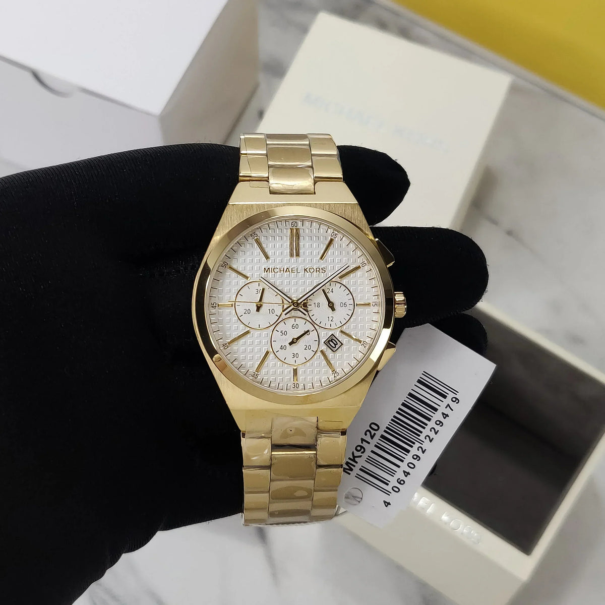  Shop Authentic Michael Kors Lennox Chronograph White Dial Gold Steel Strap Watch For Men - MK9120 - Luxxuri