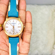  Shop Authentic Burberry The City Gold Dial Blue Leather Strap Watch for Women - BU9018 - Luxxuri