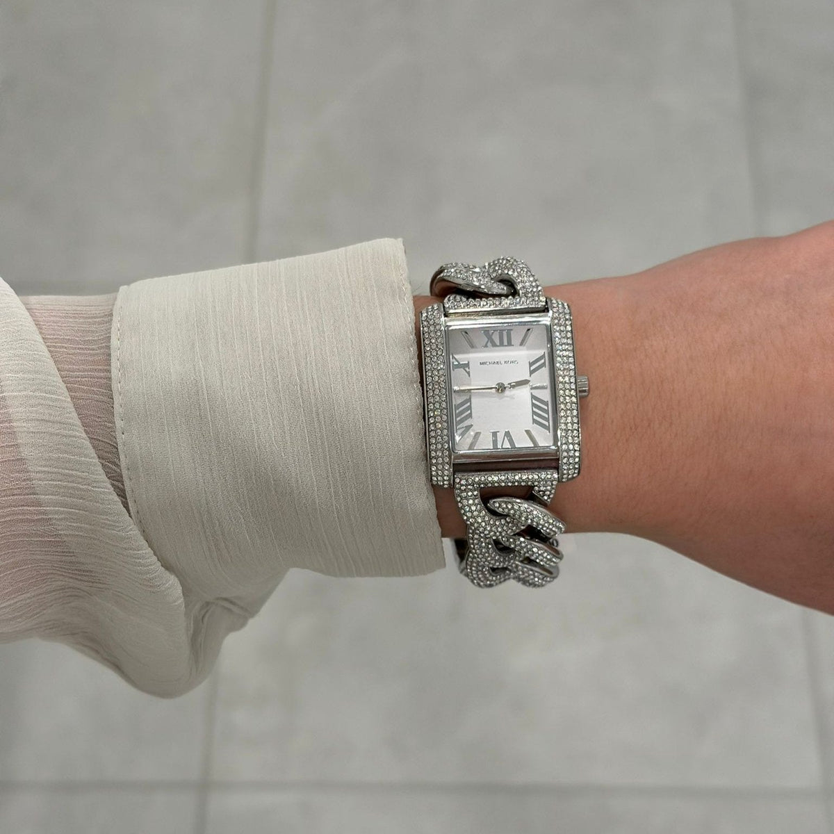  Shop Authentic Michael Kors Emery Three Hand Silver Dial Silver Steel Strap Watch For Women - MK7299 - Luxxuri