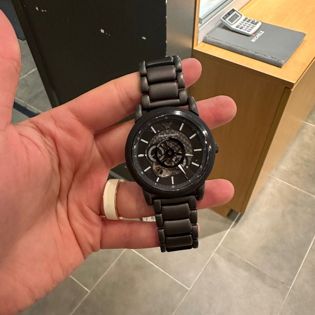  Shop Authentic Emporio Armani Meccanico Skeleton Black Dial Black Steel Strap Watch For Men - AR60045 - Luxxuri