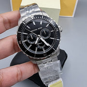  Shop Authentic Michael Kors Cunningham Multifunction Black Dial Silver Steel Strap Watch For Men - MK7156 - Luxxuri