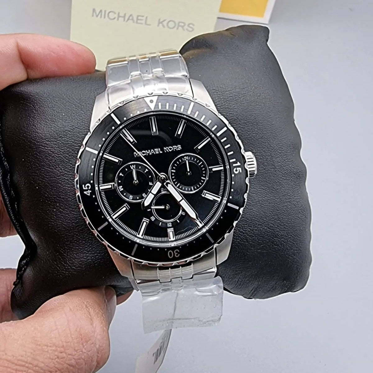  Shop Authentic Michael Kors Cunningham Multifunction Black Dial Silver Steel Strap Watch For Men - MK7156 - Luxxuri