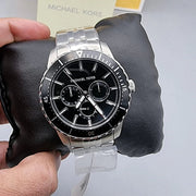  Shop Authentic Michael Kors Cunningham Multifunction Black Dial Silver Steel Strap Watch For Men - MK7156 - Luxxuri