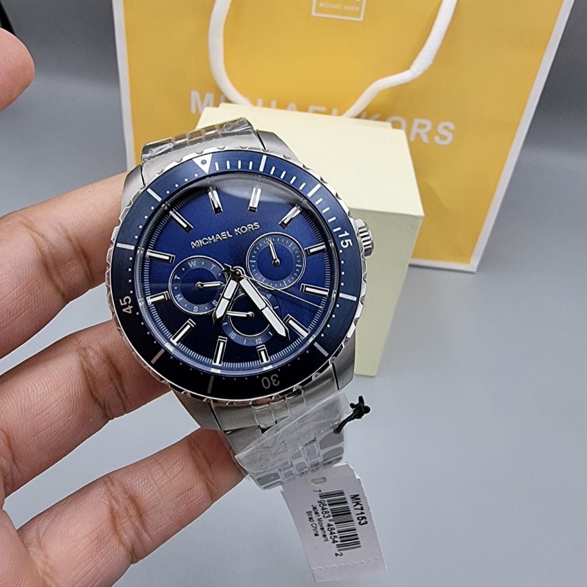  Shop Authentic Michael Kors Cunningham Multifunction Blue Dial Silver Steel Strap Watch For Men - MK7153 - Luxxuri