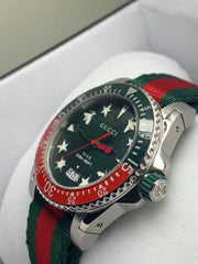  Shop Authentic Gucci Dive Quartz Green Dial Two Tone NATO Strap Watch For Men - YA136339 - Luxxuri