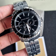  Shop Authentic Michael Kors Cunningham Multifunction Black Dial Silver Steel Strap Watch For Men - MK7156 - Luxxuri