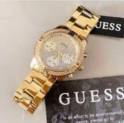  Shop Authentic Guess Confetti Diamonds Silver Dial Gold Steel Strap Watch for Women - W0774L5 - Luxxuri