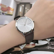  Shop Authentic Calvin Klein Minimal Silver Dial Black Leather Strap Watch for Men - K3M221CY - Luxxuri