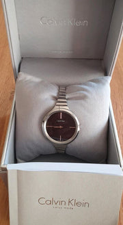  Shop Authentic Calvin Klein Lively Black Dial Silver Steel Strap Watch for Women - K4U23121 - Luxxuri