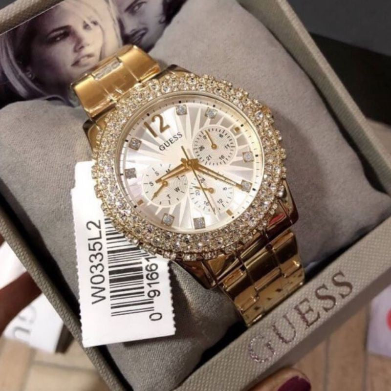  Shop Authentic Guess Dazzler Diamonds Silver Dial Gold Steel Strap Watch for Women - W0335L2 - Luxxuri