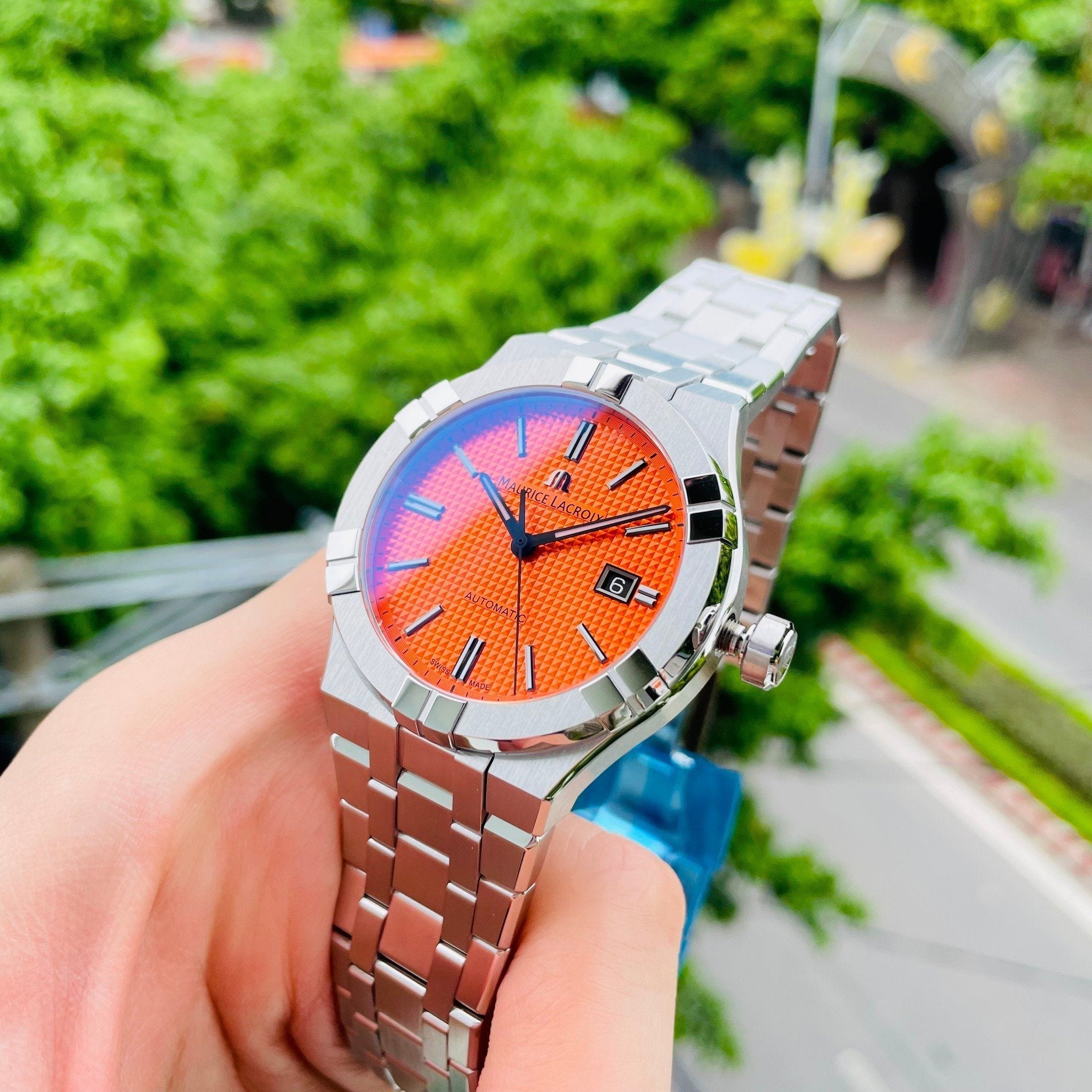  Shop Authentic Maurice Lacroix Aikon Automatic Date Orange Dial Silver Steel Strap Watch For Men - AI6008-SS00F-530-E - Luxxuri