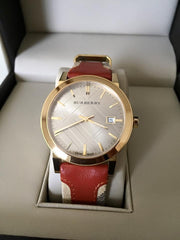  Shop Authentic Burberry The City Gold Dial Orange Leather Strap Watch for Women - BU9017 - Luxxuri