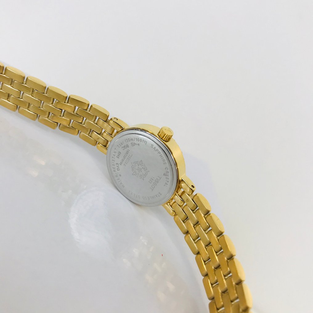 Tissot T-Lady Lovely Mother of Pearl Dial Gold Steel Strap Watch For Women - T058.009.63.116.00