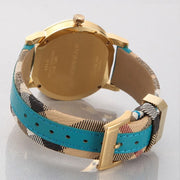  Shop Authentic Burberry The City Gold Dial Blue Leather Strap Watch for Women - BU9018 - Luxxuri