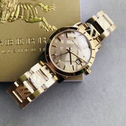  Shop Authentic Burberry The City Gold Dial Gold Steel Strap Watch for Women - BU9145 - Luxxuri