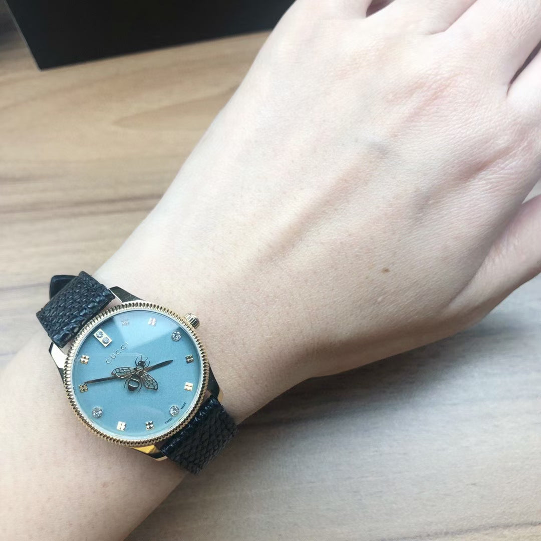  Shop Authentic Gucci G Timeless Quartz Blue Dial Black Leather Strap Watch For Men - YA1265018 - Luxxuri