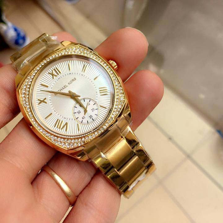  Shop Authentic Michael Kors Byrn Quartz Gold Dial Gold Steel Strap Watch For Women - MK6134 - Luxxuri