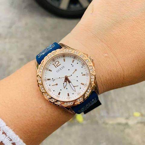 Shop Authentic Guess Swirl Analog Quartz White Dial Blue Rubber Strap Watch for Women - W1096L4 - Luxxuri