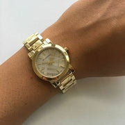  Shop Authentic Burberry The City Gold Dial Gold Steel Strap Watch for Women - BU9234 - Luxxuri
