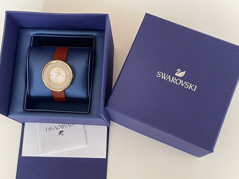  Shop Authentic Swarovski Crystalline Pure White Dial Brown Leather Strap Watch for Women - 5275040 - Luxxuri