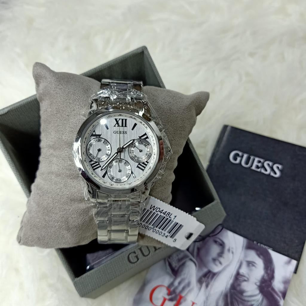  Shop Authentic Guess Mini Sunrise Silver Dial Silver Steel Strap Watch For Women - W0448L1 - Luxxuri