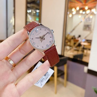  Shop Authentic Gucci G Timeless Quartz Diamonds Pink Dial Red Leather Strap Watch For Women - YA1265017 - Luxxuri