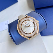  Shop Authentic Swarovski Crystalline Aura Silver Dial Beige Leather Strap Watch for Women - 5519450 - Luxxuri