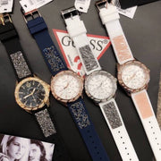  Shop Authentic Guess Swirl Quartz Silver Dial White Silicone Strap Watch for Women - W1096L1 - Luxxuri