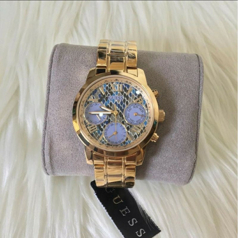  Shop Authentic Guess Mini Sunrise Quartz Blue Dial Gold Steel Strap Watch For Women - W0448L6 - Luxxuri