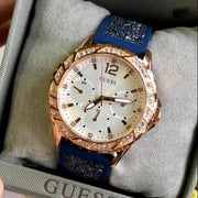  Shop Authentic Guess Swirl Analog Quartz White Dial Blue Rubber Strap Watch for Women - W1096L4 - Luxxuri