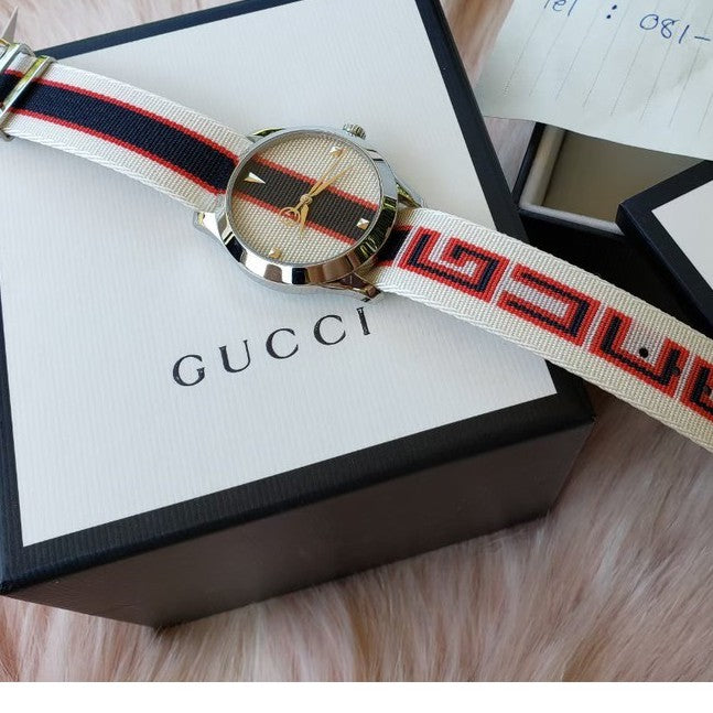  Shop Authentic Gucci G Timeless Quartz White Dial Two Tone NATO Strap Watch For Men - YA1264071 - Luxxuri