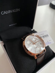  Shop Authentic Calvin Klein Posh Chronograph White Dial Brown Leather Strap Watch for Men - K8Q376G6 - Luxxuri