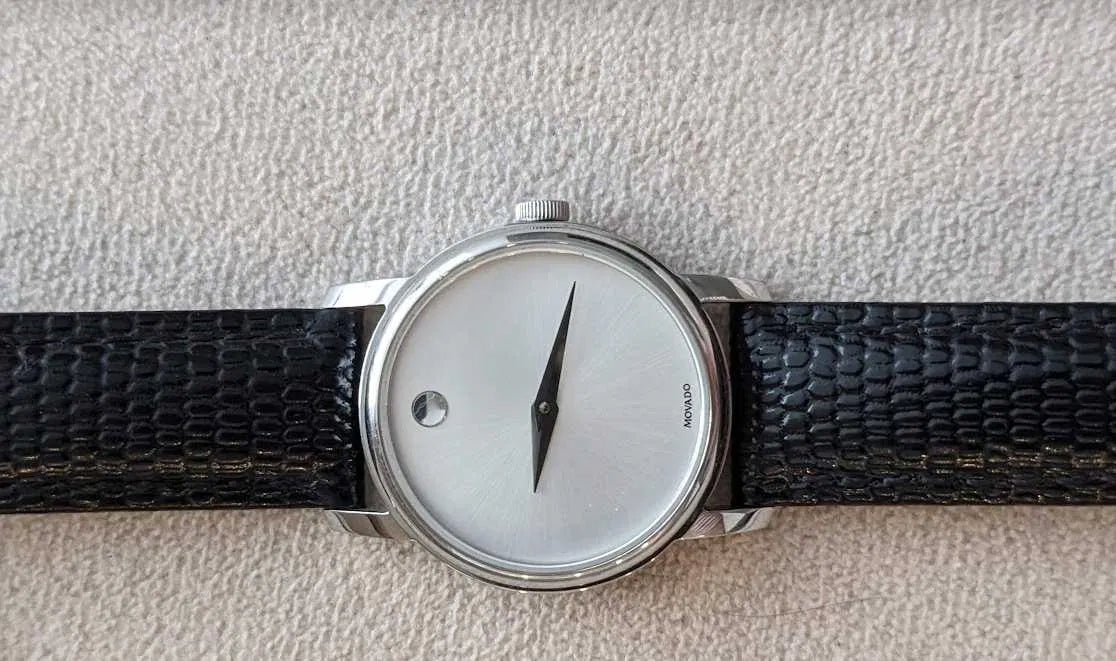  Shop Authentic Movado Museum Quartz Silver Dial Black Leather Strap Watch For Men - 2100001 - Luxxuri