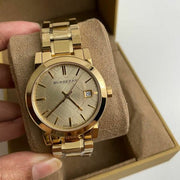  Shop Authentic Burberry The City Gold Dial Gold Steel Strap Watch for Women - BU9134 - Luxxuri