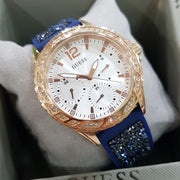  Shop Authentic Guess Swirl Analog Quartz White Dial Blue Rubber Strap Watch for Women - W1096L4 - Luxxuri