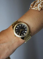  Shop Authentic Guess Sparkler Diamonds Black Dial Gold Steel Strap Watch for Women - GW0111L2 - Luxxuri
