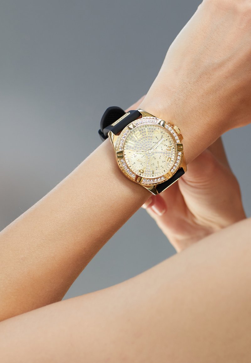  Shop Authentic Guess Frontier Diamonds Gold Dial Black Rubber Strap Watch For Women - W1160L1 - Luxxuri
